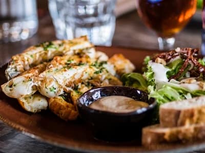 Grilled seafood with bread and sauce